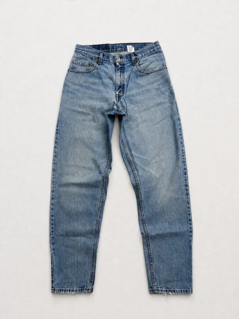 Vintage Levi's 560 Jeans Men's 29x32 Loose Fit Tapered Leg Light Wash 90s
